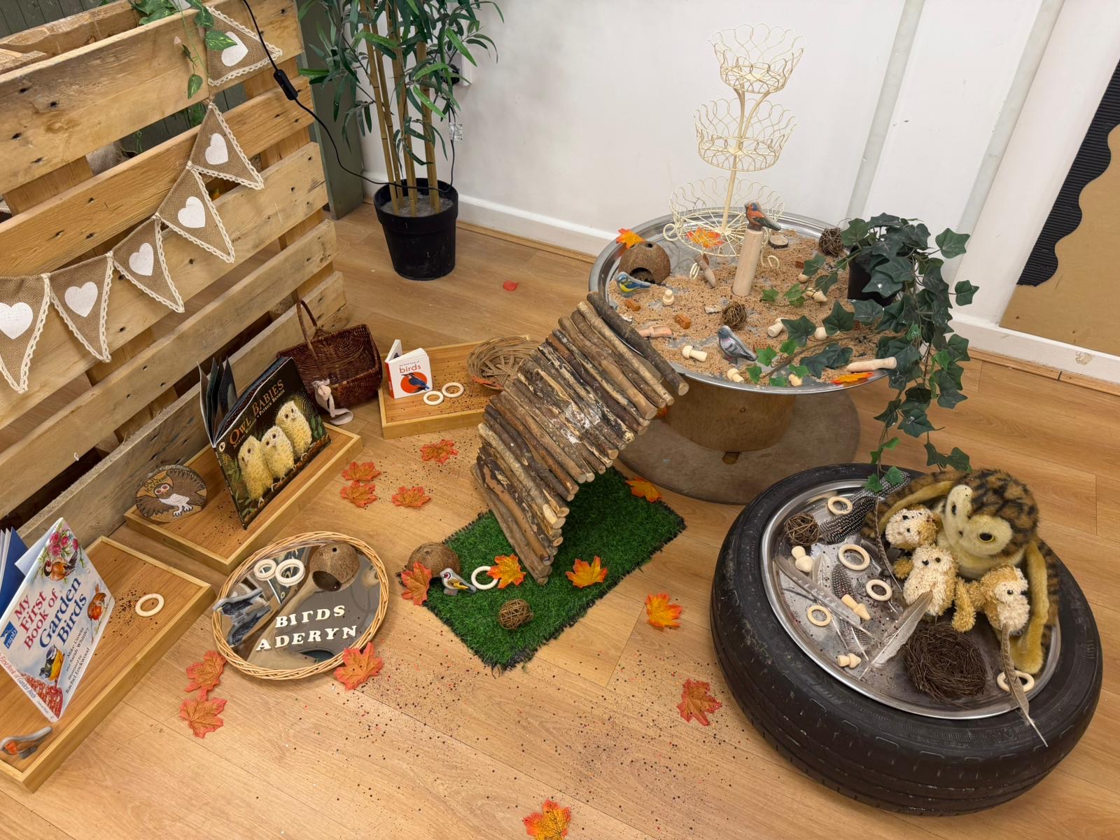 A cosy sensory and book corner with natural materials at Wibli Wobli Newport