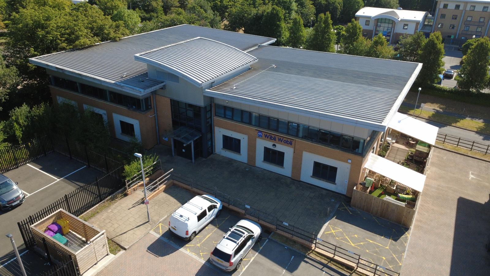 Aerial view of the Wibli Wobli Newport nursery building and outdoor areas at Oak House